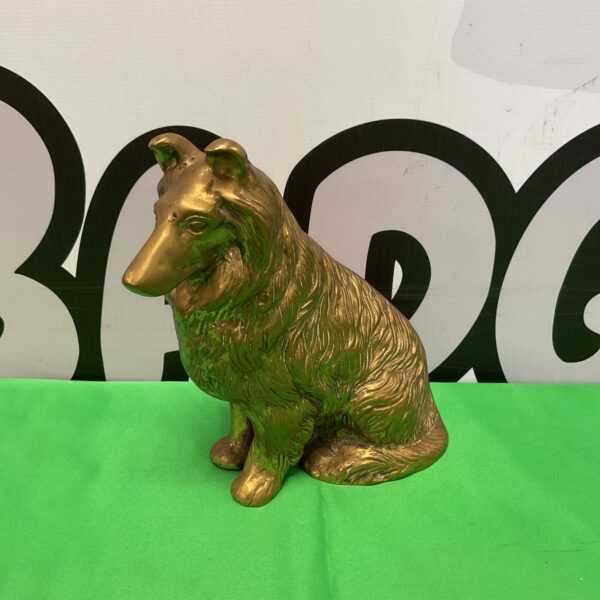 Vintage brass collie dog ornament, detailed sculpture.