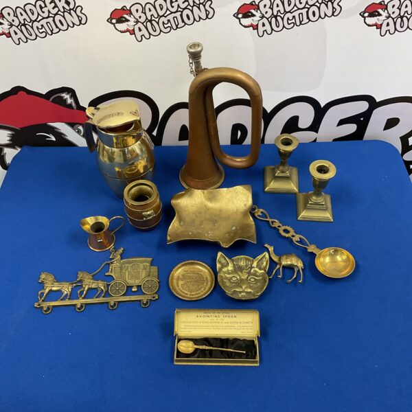 Vintage brass and copper lot featuring bugle horn and candlesticks.