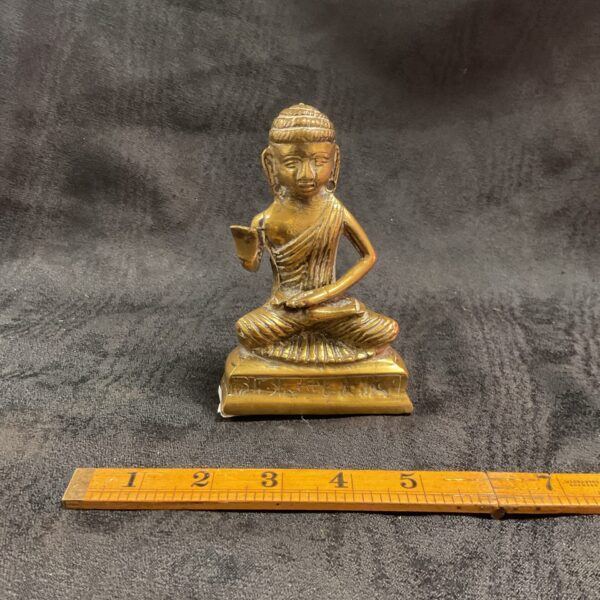Detailed brass Ganesha statue, Hindu deity sculpture.