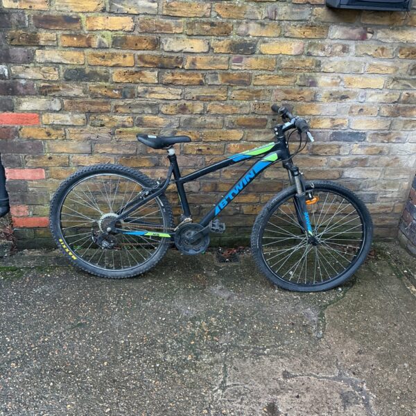 Used Btwin mountain bike for sale, ideal for off-road cycling.