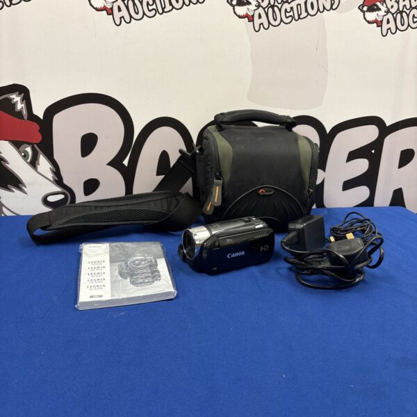 Canon Legria HF R27 camcorder with charger in case.
