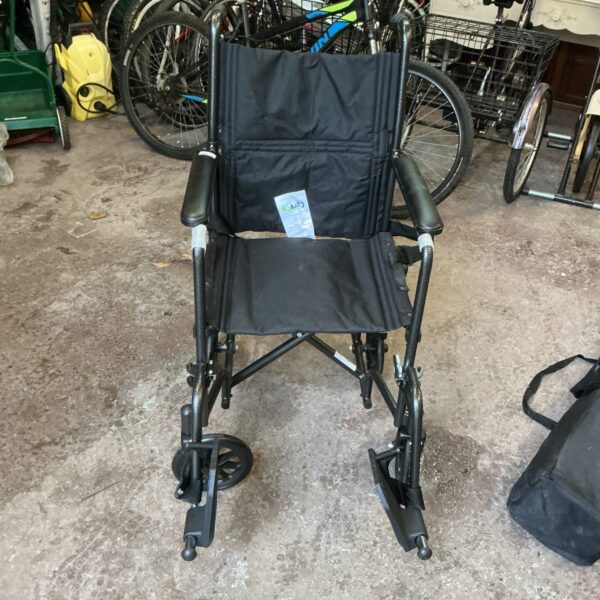 Used Care Co folding wheelchair, a lightweight mobility aid.