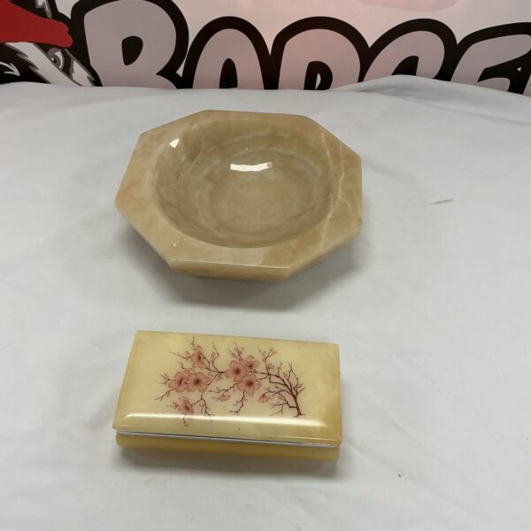 Elegant carved onyx bowl for home decor.