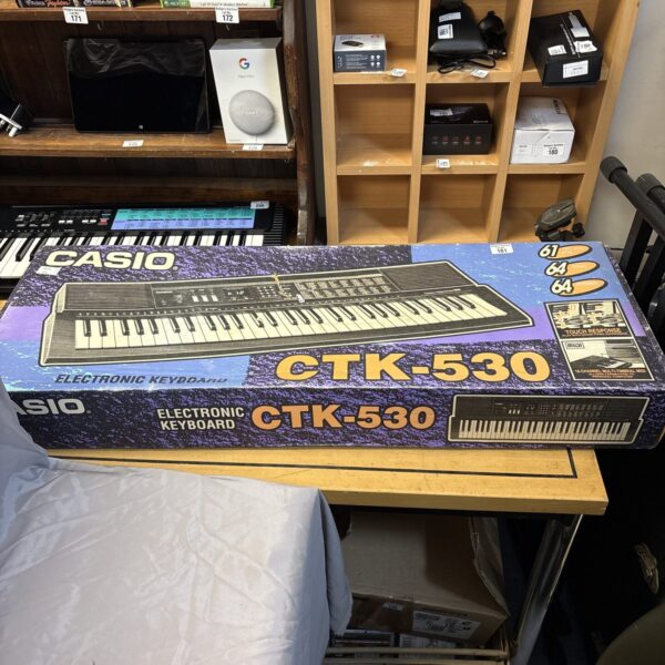 Casio CTK 530 keyboard in its original box.