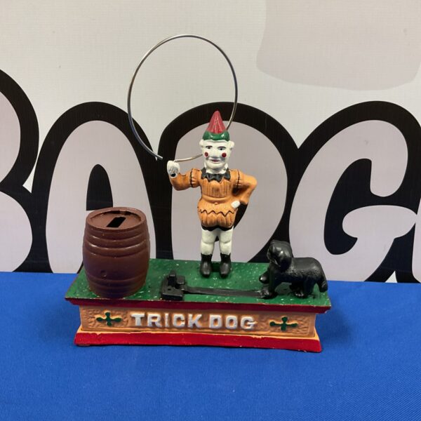Antique cast iron trick dog money box, vintage mechanical bank.