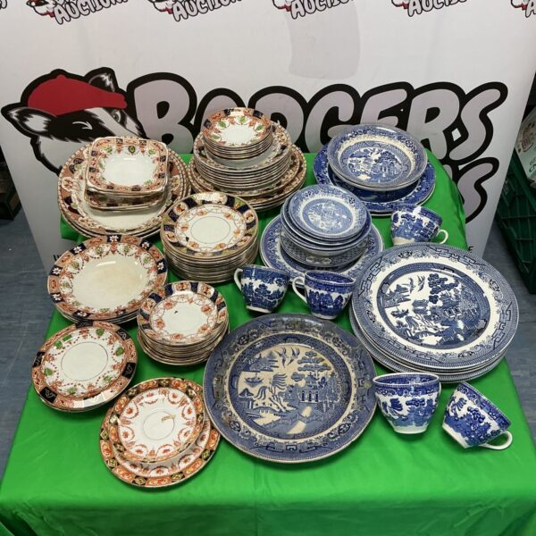 Large lot of vintage china plates and cups, including willow pattern.
