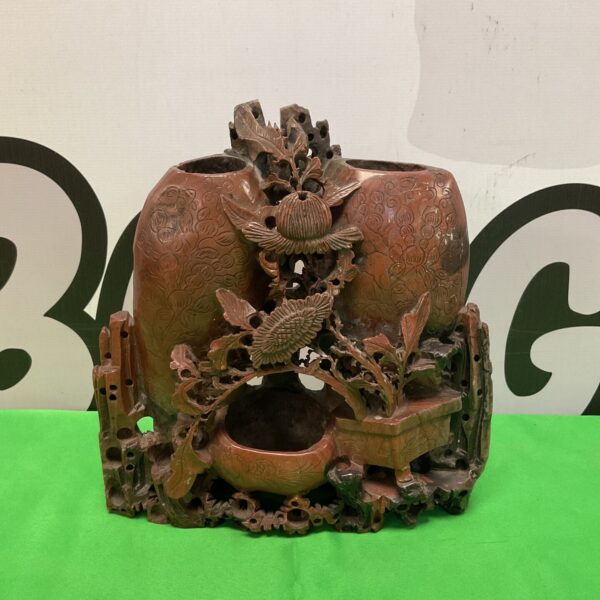 Vintage Chinese carved soapstone brush pot with landscape design.
