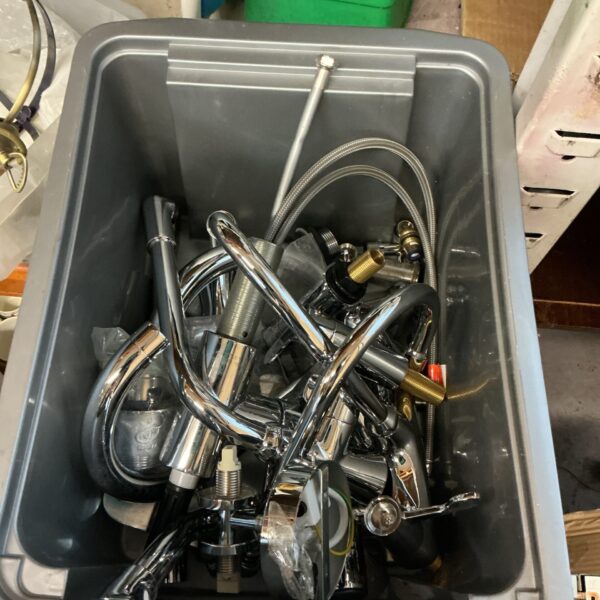 Mixed lot of chrome taps and plumbing fittings for restoration.