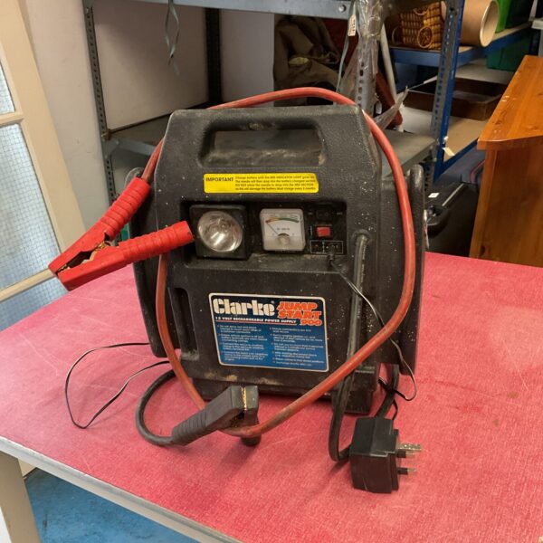 Vintage Clarke jump starter 500 with cables and ammeter.