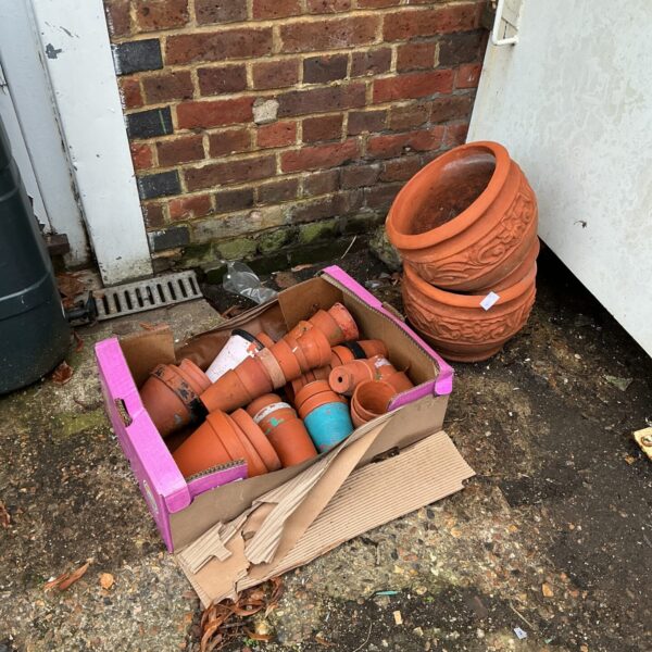 Lot of terracotta clay plant pots for garden use.