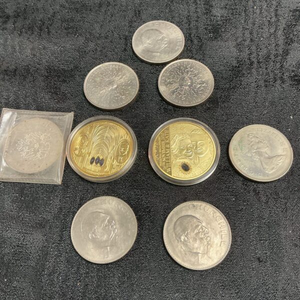 Overview of a commemorative coin collection including royal wedding coins.
