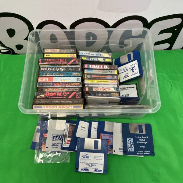 Vintage Commodore 64 and Amiga games lot for retro gaming collectors.