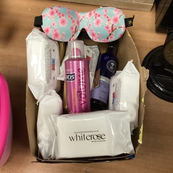 Cosmetic and beauty lot with hairspray, wipes, and sleeping mask.