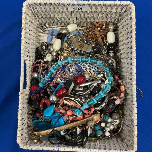 Assortment of vintage and costume jewellery including necklaces and brooches.