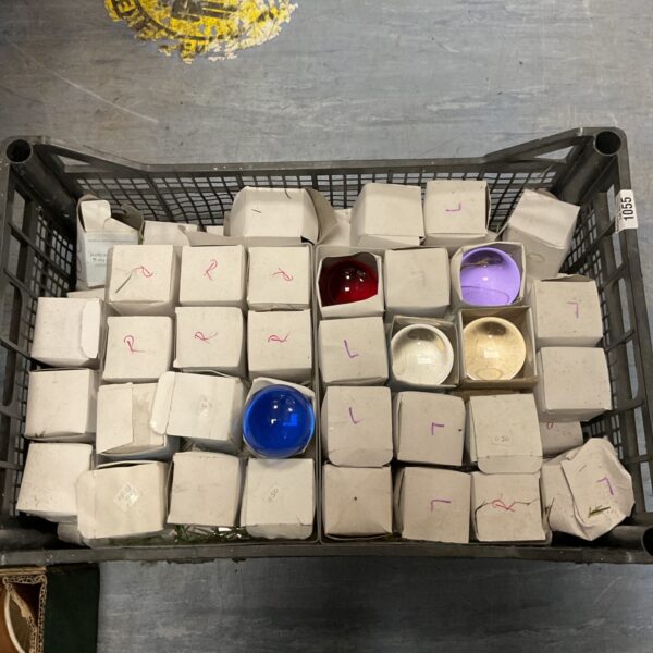 Large lot of colourful crystal glass balls for display.
