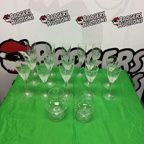 Elegant set of vintage etched crystal glasses for serving drinks.