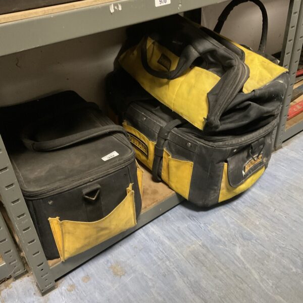 Lot of three empty Dewalt tool bags for tool storage.