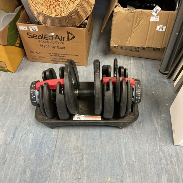 Metal dumbbell set for strength training and fitness exercises.