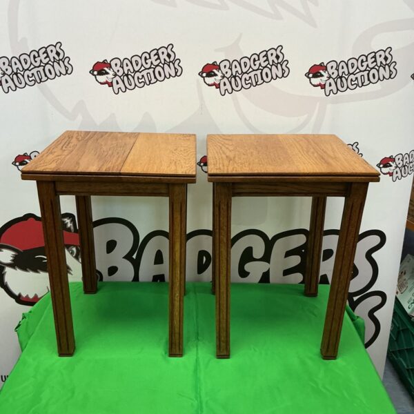 Pair of vintage Durban de Brugge oak lamp tables against a backdrop.