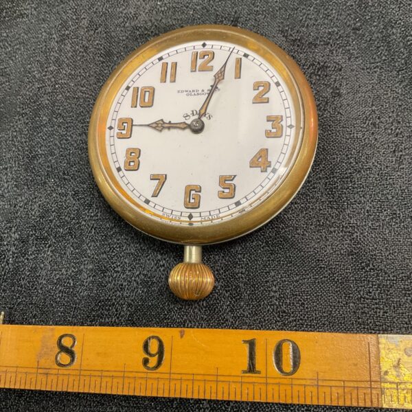 Vintage Edward & Sons Goliath pocket watch with white dial.