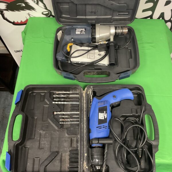 Electric drill set in carrying case, PBX and Titan brands.