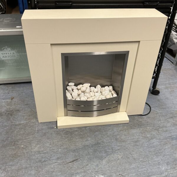 Modern electric fire suite with a white hearth and black fire unit.