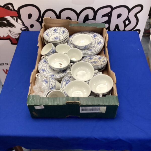 Vintage English china tea set displayed on a tray.