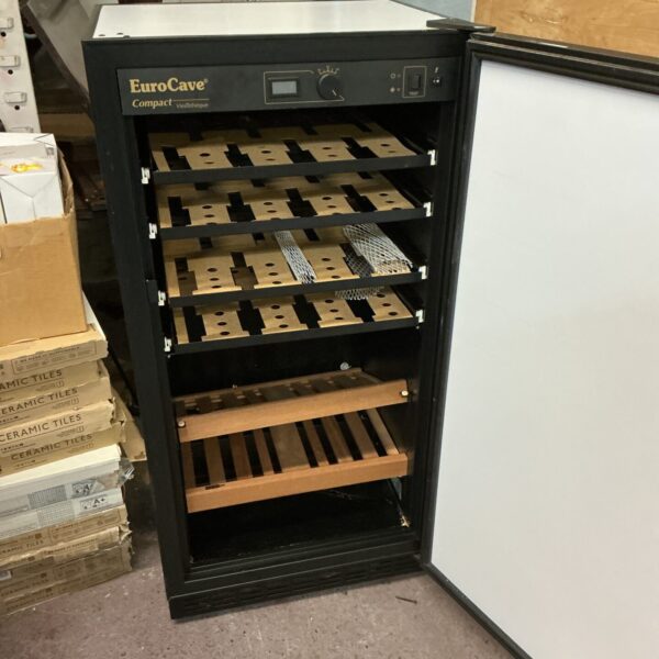 Front view of a vintage EuroCave compact wine chiller.