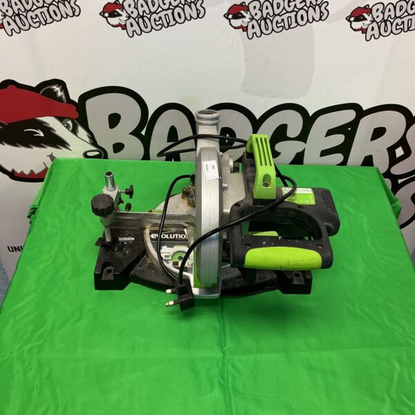 Evolution chop saw for metal cutting in a workshop setting.