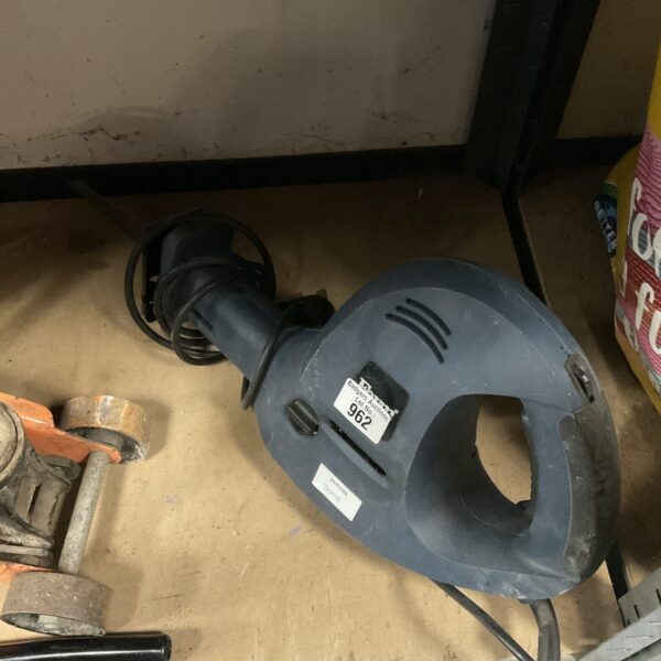 Vintage Ferm electric reciprocating saw, a powerful DIY tool.
