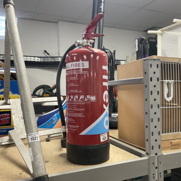 Red Firexo all fires extinguisher with empty gauge.