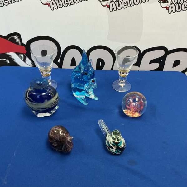 Vibrant floral glass paperweight, a beautiful collectible art piece.