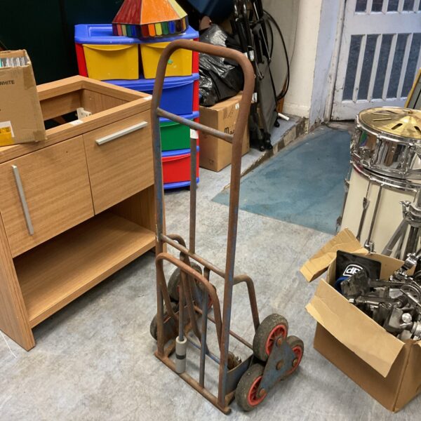 Metal folding sack barrow with two wheels.