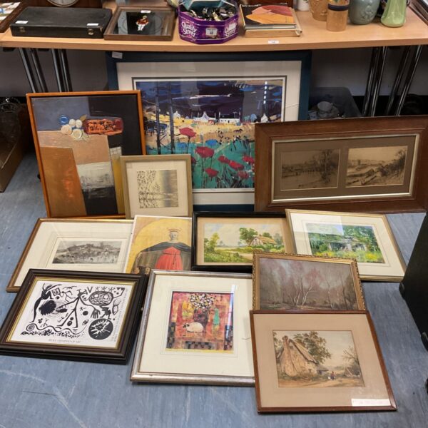 Mixed lot of framed landscape prints and paintings for wall decor.