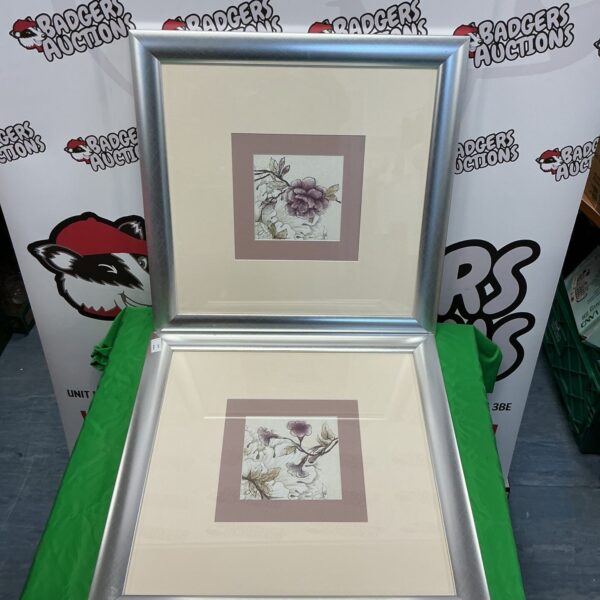 Vintage framed flower prints for elegant wall decor.