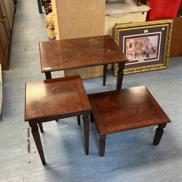 Set of three G-Plan Next mahogany nesting coffee tables.