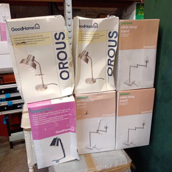 Six boxed GoodHome table lamps ready for use.