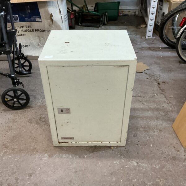 Front view of a vintage Governor metal safe.
