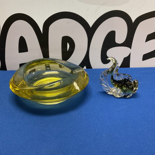 Vibrant green art glass dish with flowing mid-century modern design.