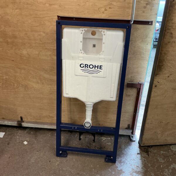 Used Grohe concealed cistern unit for bathroom installation.