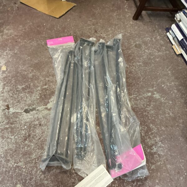 Packaged set of four metal hairpin table legs for furniture projects.