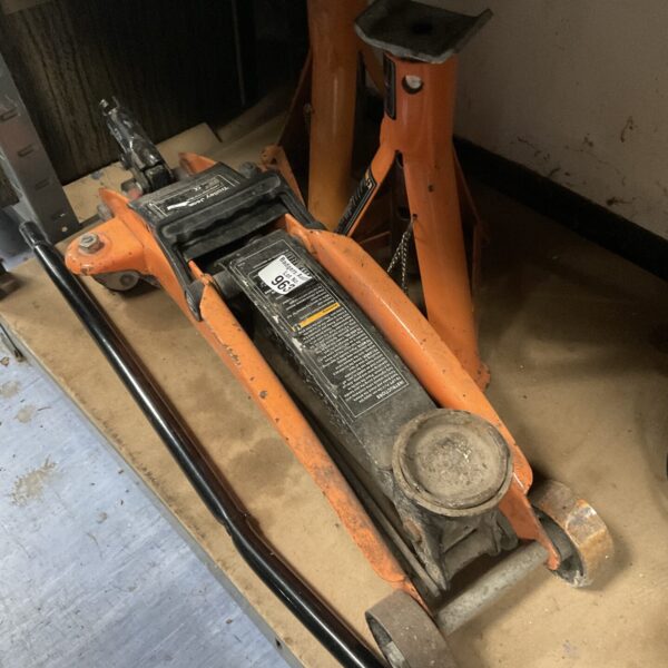 Used Halfords 2 ton trolley jack for vehicle maintenance.