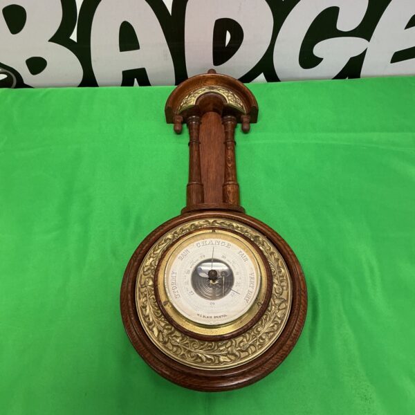 Antique H C Blair oak and brass aneroid barometer.