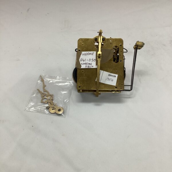 Vintage Hermie 241-030 clock movement with brass gears.