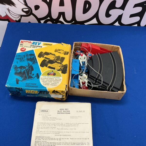 Vintage High Rev slot car racing game packaging, collectible toy.