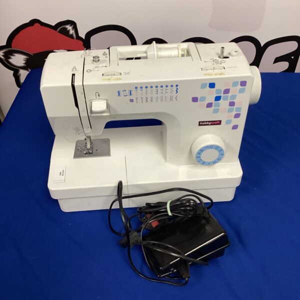 Vintage Hobbycraft electric sewing machine with foot pedal.
