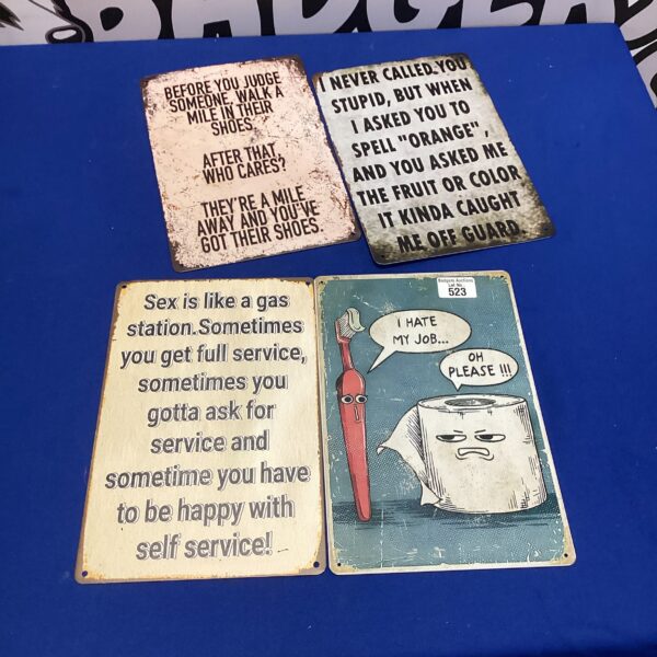 Collection of novelty tin signs