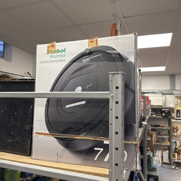 iRobot Roomba robotic vacuum cleaner, side view.