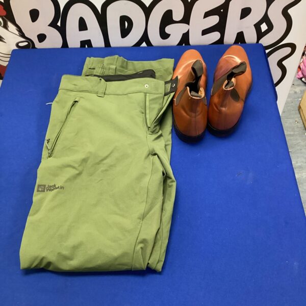 Jack Wolfskin trousers and Grison leather boots for outdoor activities.