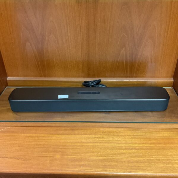 Black JBL soundbar for home theatre audio enhancement.
